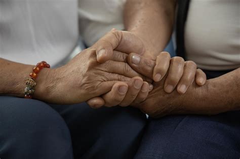 Midsection of couple hands | Premium Photo