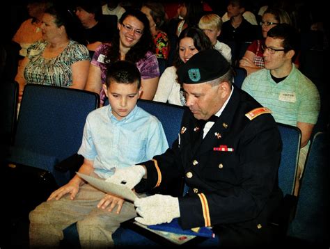 CW2 Ricky Blue, of NCNG's 113th Sustainment Brigade looks at son's ...