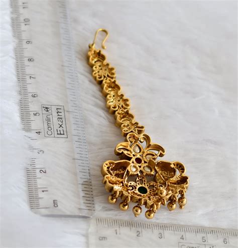 Antique gold tone cz-ruby-green peacock nakshi tikka dj-49832 – dreamjwell