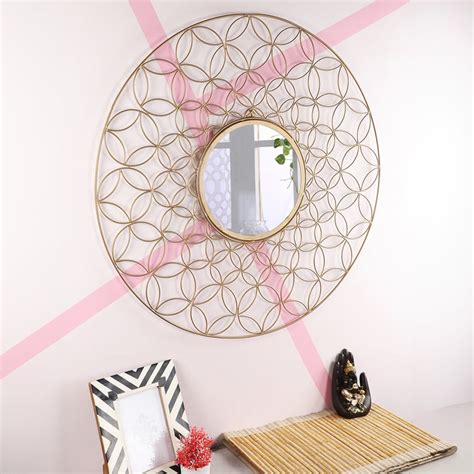 Buy HOME SPARKLE Metal Wall Mirror from Home Sparkle at just INR 6299.0