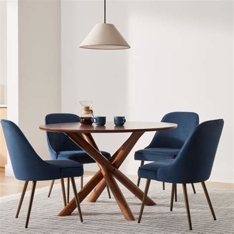 17 of the Best Mid Century Modern Round Dining Tables - Happily Inspired