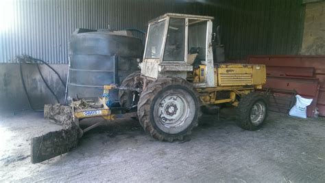 Image result for Bell Scraper Tractor