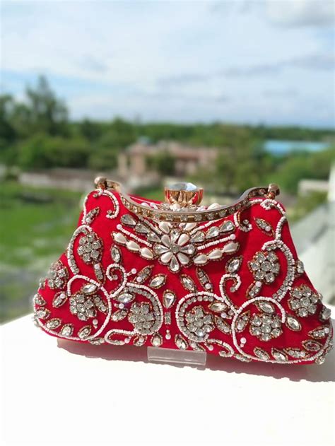 Stylish Look Pearl And Stone Hand Bag Collection