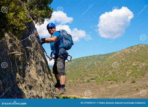 A Man Climbing a Ferrata Route in Calcena, Spanish Mountains Stock ...