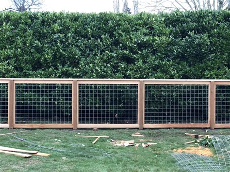 Diy fence and gate plans featuring wild hog black metal railing panels ...