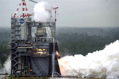 Free Photo: NASA test fires SLS rocket engine for Moon mission
