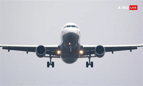 Passenger Held At Varanasi Airport For Attempting To Open Flight ...