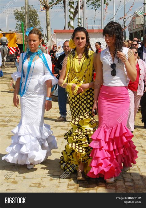 Spanish Women In Traditional Spanish Feria Dress Prior To Festival ...