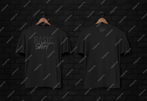 Mens black short sleeve tshirt mockup in black wall surface with dark ...