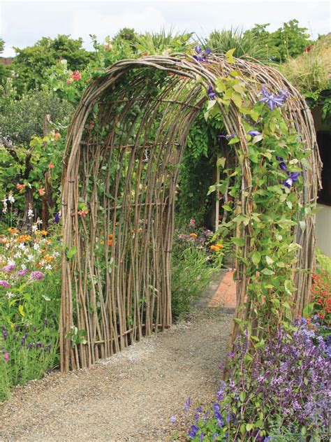 Living Willow Arch With Purple Clematis | Garden archway, Diy garden ...