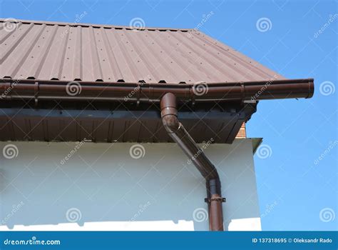 House Metal Roof Corner with Plastic Rain Gutter Pipeline System Stock ...