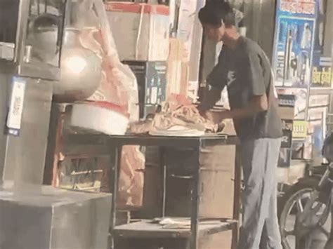 Spit in the tandoor while making roti at a chicken shop