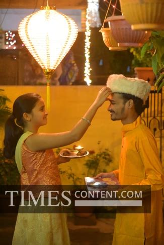 Bhau-Beej Feature Photo A young girl greets her brother...