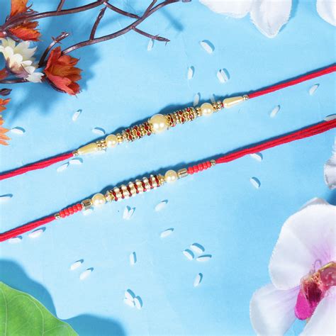 Riddhika Ventures Lavish Pearl and Dimond Ring Rakhi (J1K1)