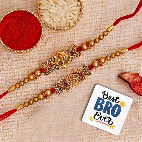 eCraftIndia Set of 2 Lord Ganesha and Om Religious Rakhis, Best Bro ...