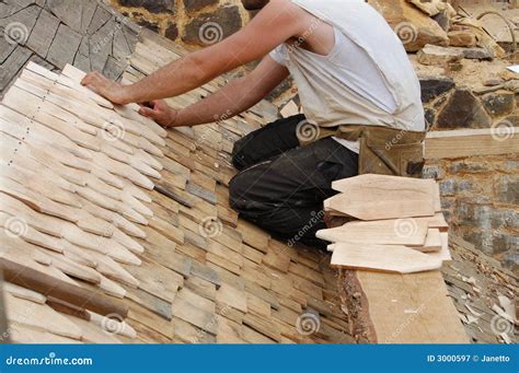 Laying wooden roof tiles stock image. Image of tiles, craft - 3000597