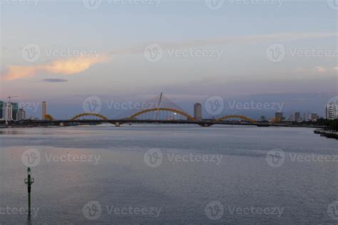 The Dragon Bridge in Da Nang at dusk 14323693 Stock Photo at Vecteezy
