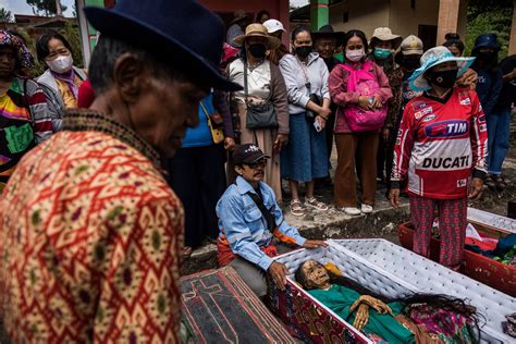An Indonesian Tradition Of Digging Up Dead Relatives For A Spirited Afterlife Ritual