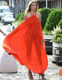 Jessica Hart shows off slender figure in completely sheer orange dress | Daily Mail Online