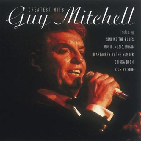 Greatest Hits: Guy Mitchell: Amazon.in: Music}