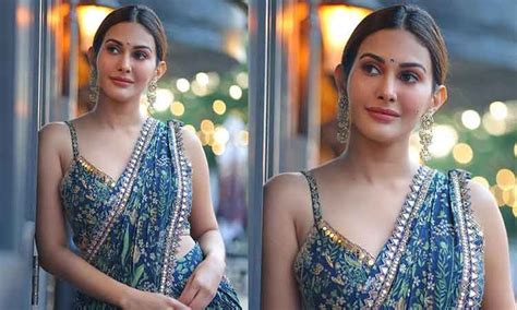 Intriguing Amyra Dastur shines in a printed pre-draped saree ensemble