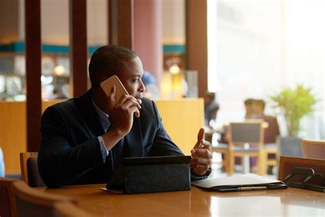 Photo of Business Owner Calling Someone 的图像结果