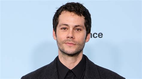 Dylan O'Brien in red lingerie in Fantasmas has the gays thirsting