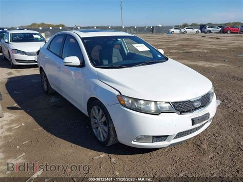 Report KNAFW4A39B5317304 KIA FORTE 2011 White Gasoline - price and damage history