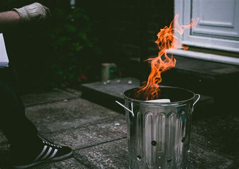 Download Stainless Steel Trash Can On Fire Wallpaper | Wallpapers.com
