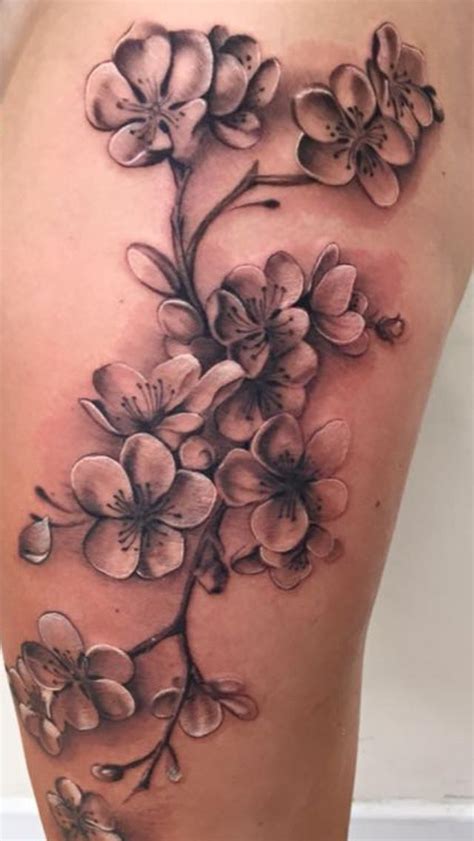 Cherry blossom on thigh in black and grey - by Nico Dray (The Worlds ...
