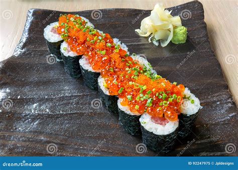 Raw Fish Sushi Roll with Egg Roe Stock Image - Image of stone, wrap ...