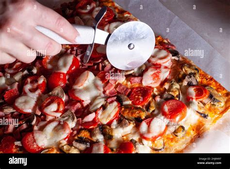 Image result for Someone Using Pizza Cutter