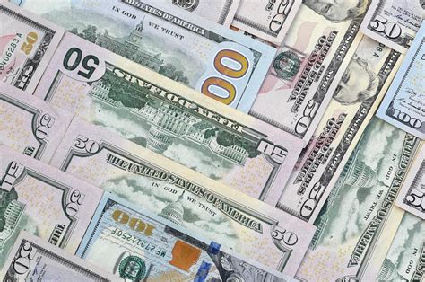 Premium Photo | Many one hundred and fifty dollar bills on flat ...