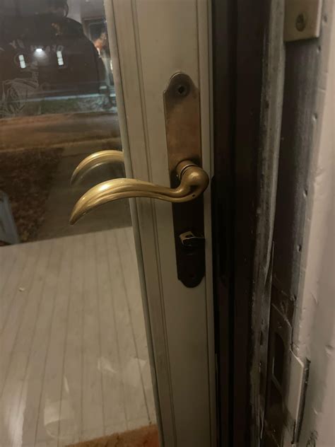 How do I remove this door handle? : r/howto