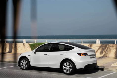 Rent Tesla Model Y White in Dubai - Electric - Octane.Rent