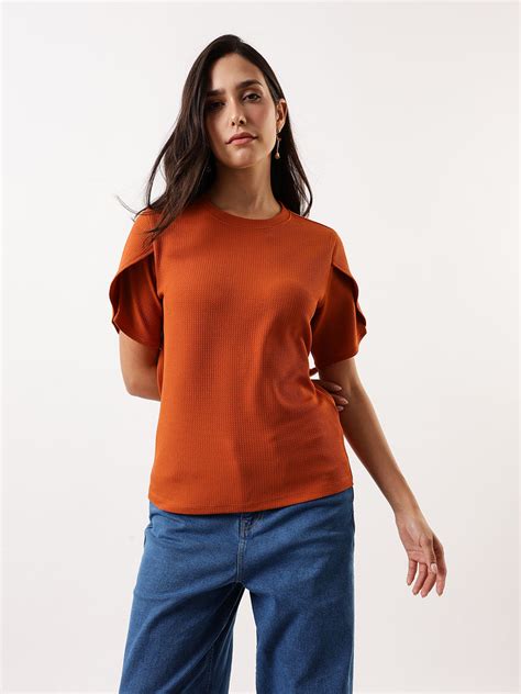 DL Woman Rust Solid Textured Round Neck Petal Sleeves Top – DENNIS LINGO