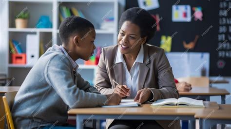 Premium Photo | Teacher talking with her student in class