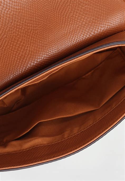 Buy Women Textured Half Moon Sling Bag Online at just Rs. 999.0 ...