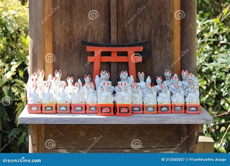 Statues Of Foxes At Fushimi Inari-taisha Shrine. A Famous Shrine In The ...