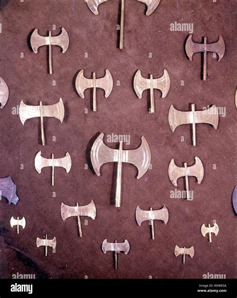 The sacred symbolof the labrys. Miniature gold double axes from the ...