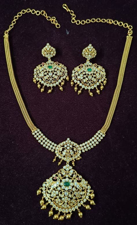 Mid Length Necklace in Gold Finish Petal Design Hanging Gold Balls in ...