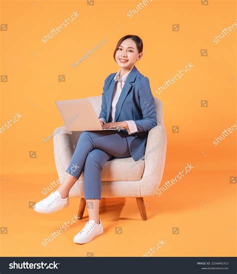 Businesswoman Sitting in Office Stock 的图像结果