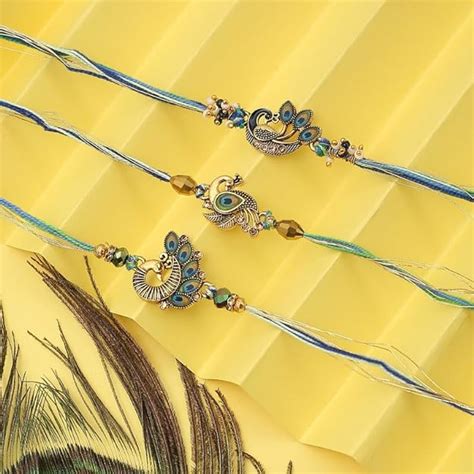 Meenakari Golden Peacock Rakhi – The Purple Tree