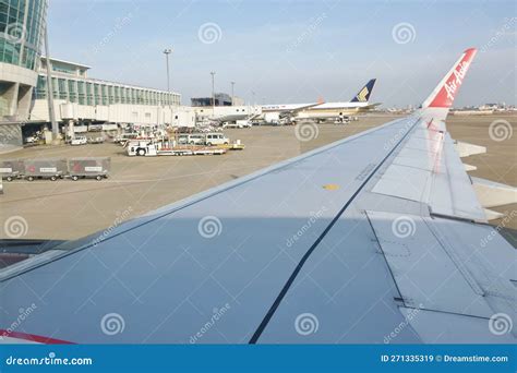 Wing on Commercial Plane Take Off from Fukuoka Airport Editorial Stock ...