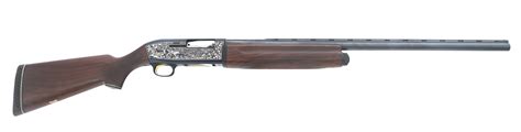 At Auction: ITHACA SKB MODEL 900 12 GAUGE SEMI AUTO SHOTGUN