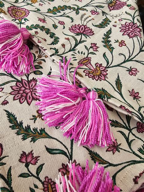 White Floral Handloom Sofa Cover with Pink Tassels | Varsaca
