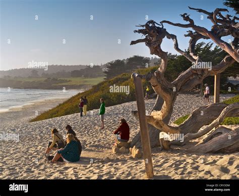 Visitors and residents gather on the beach to watch the spectacular ...