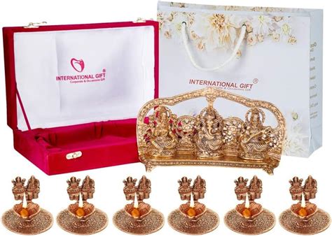 Buy INTERNATIONAL GIFT® Copper Plated Laxmi Ganesh Saraswati GodIdol ...