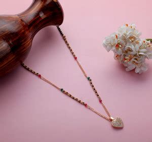 Taksheel Enterprise Gold Plated White American Diamond Pendant With ...