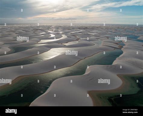 Aerial view of Lencois Maranhenses. White sand dunes with pools of ...